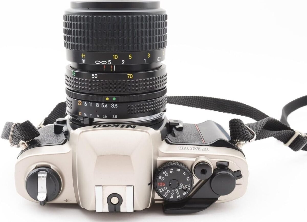 1754950904 nikon fm 10 slr camera with 35 70mm f3.5 4.8 zoom lens renewed.jpg