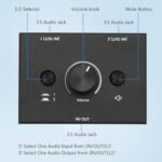 1759554163 3.5mm stereo audio switch audio switcher passive speaker headphone man.jpg